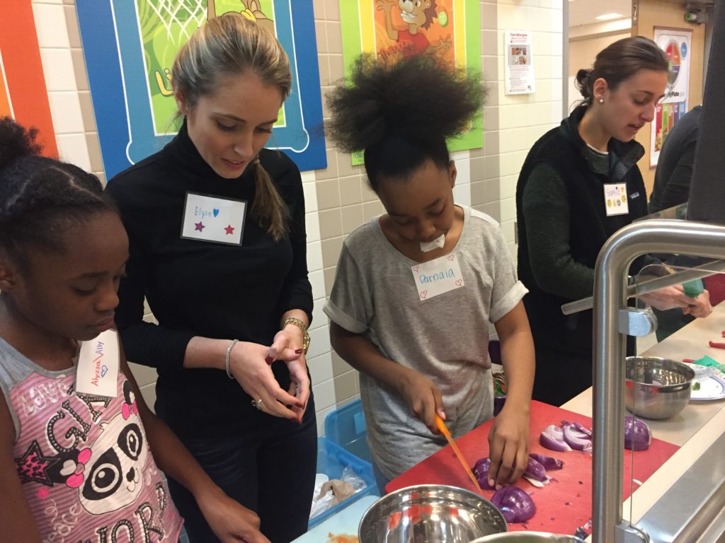 JL Boston volunteers and program participants at Kids in the Kitchen